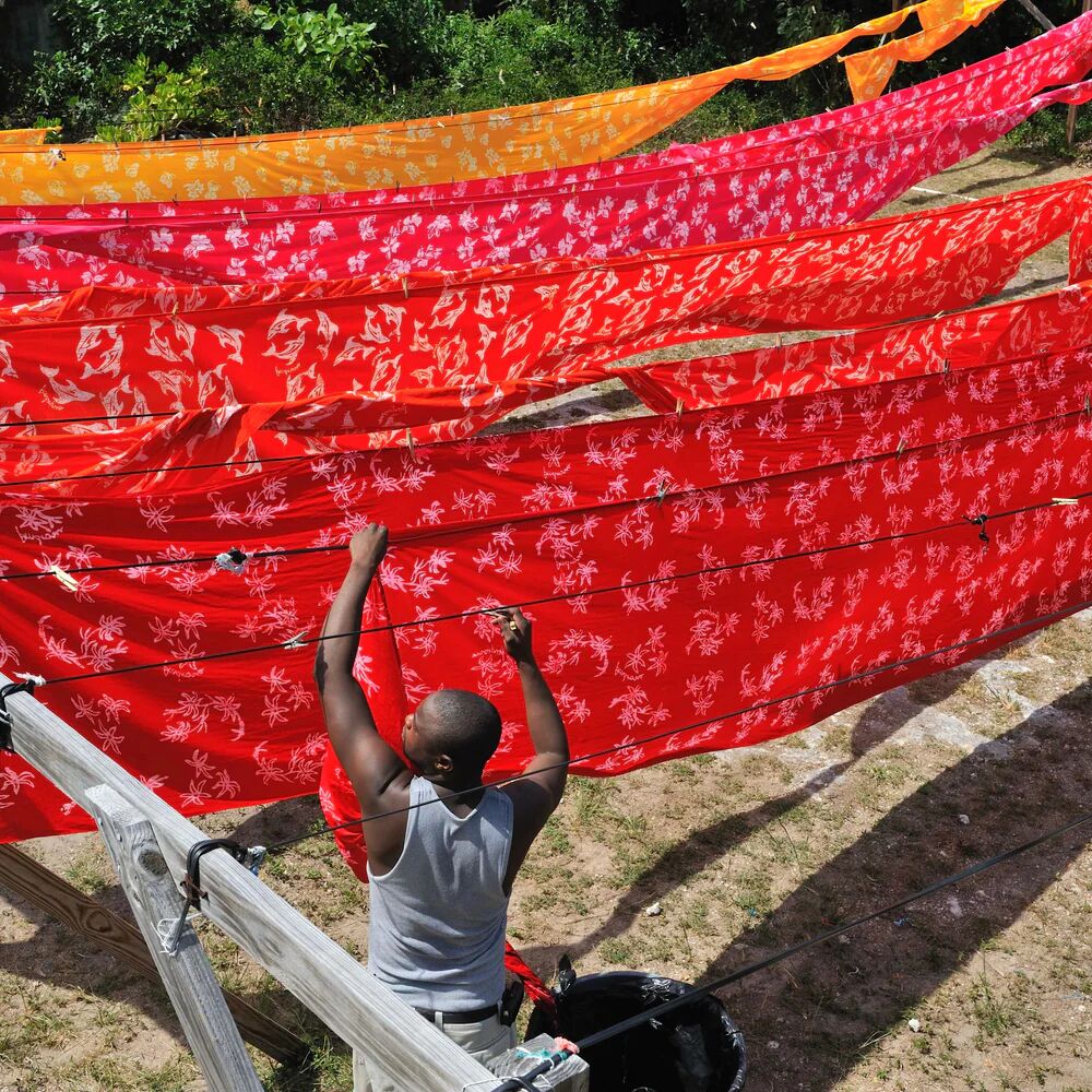 Androsia batik fabric hanging to dry
